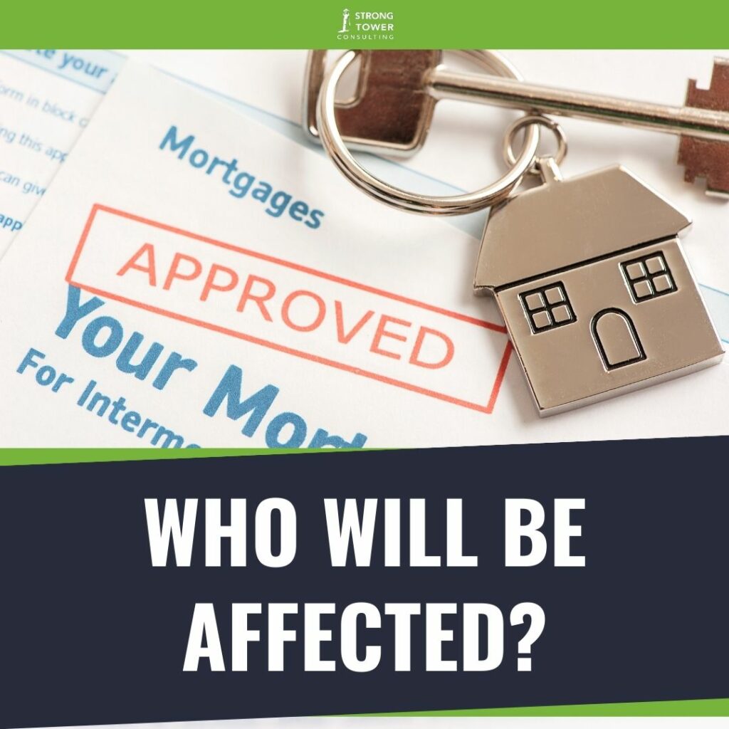 Mortgage approval papers with house keys on top. 