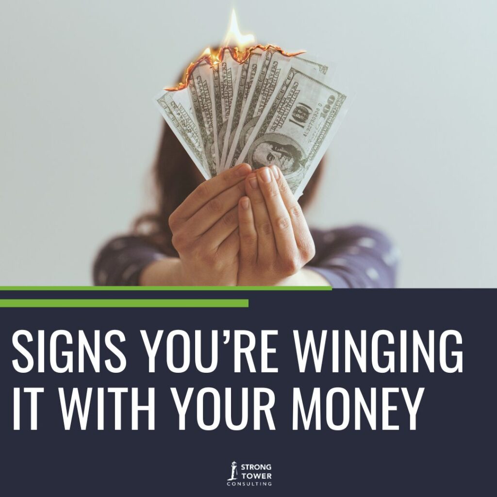 Woman holding out burning money