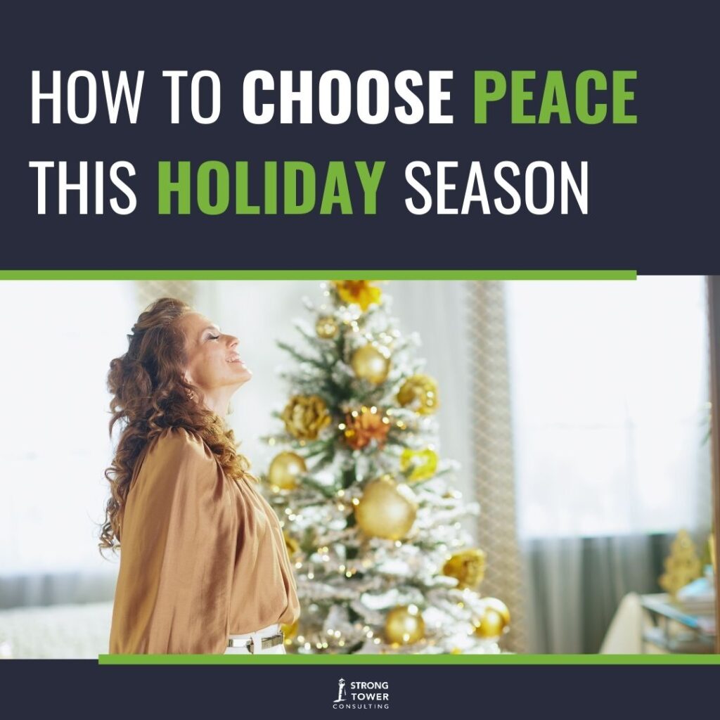 Content woman taking a deep breath in front of a Christmas tree