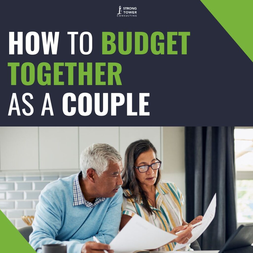 Couple budgeting together in their kitchen