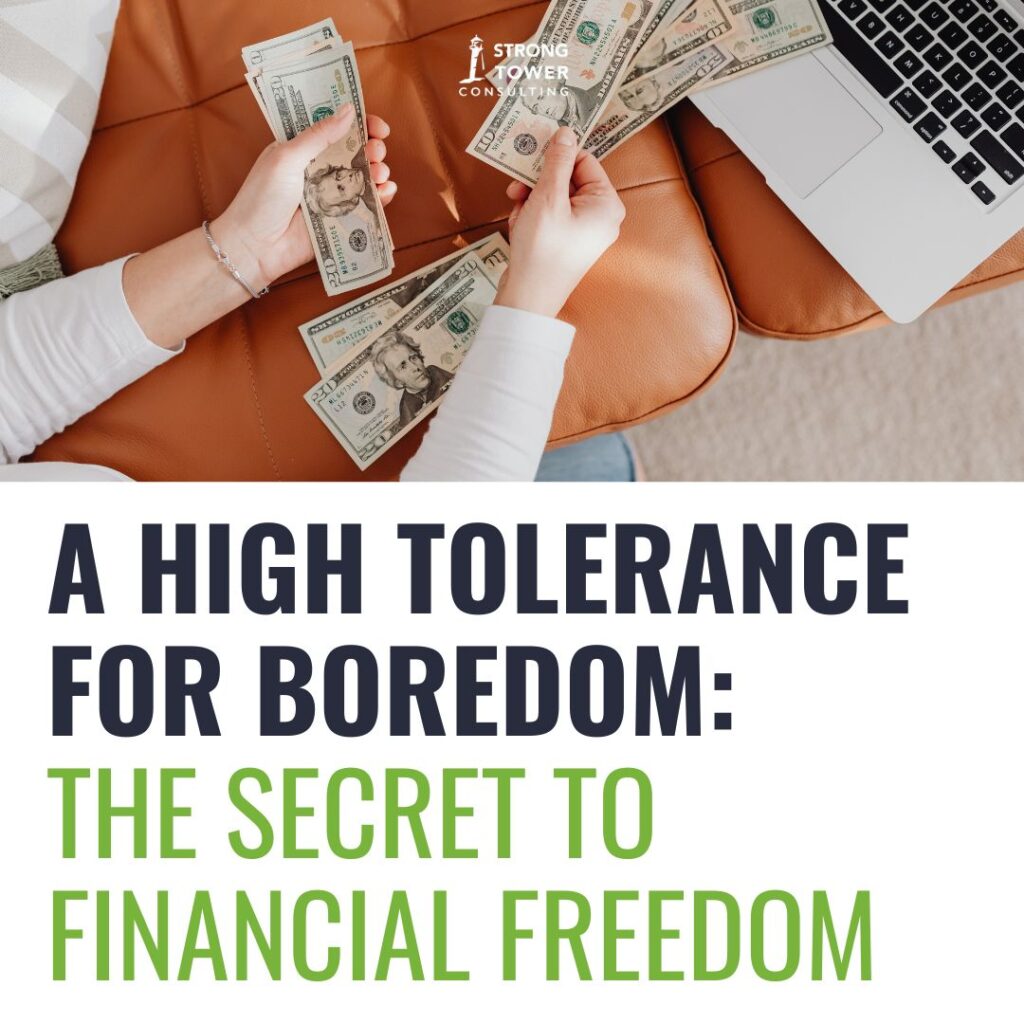 Person counting out their money in front of their laptop